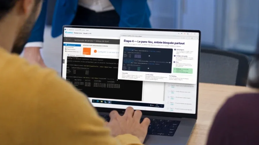 Un ordinateur portable où le support de cours s'ouvre par-dessus la console d'un serveur Windows